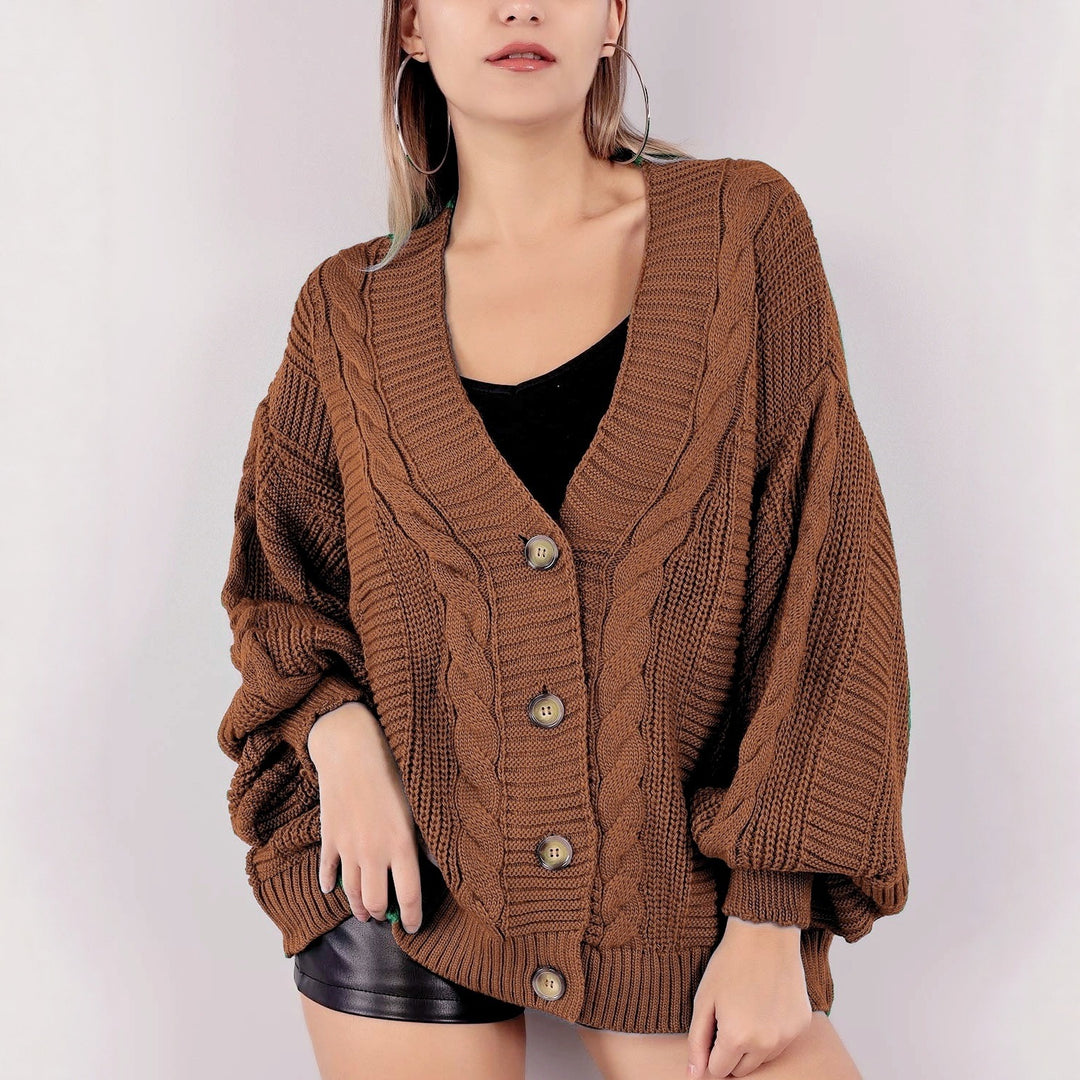 Damen Grobstrickjacke mit eleganter Knopfleiste und voluminösen Puffärmeln EB