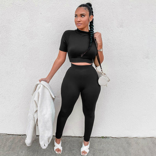 Damen Sportliches Set aus kurzlich-ärmeligem Crop-Top und enganliegenden Leggings EB