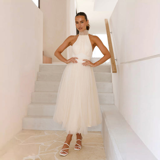 Damen Tüllkleid mit elegantem Halterneck und schwingendem Rock EB
