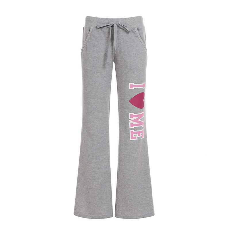 Damen nan weiche Flared-Jogginghose mit Kordelzug, Eingrifftaschen und auffälligem Love-Print EB