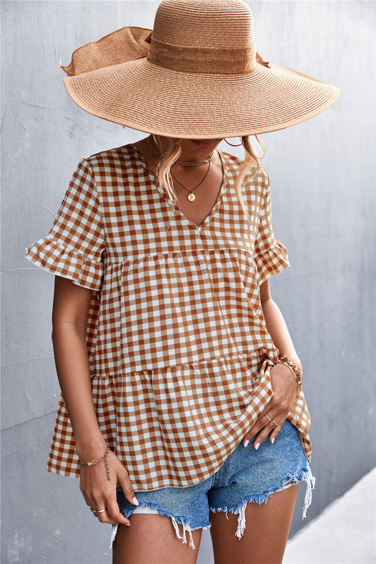 Damen Blusenshirt mit rüschenförmigem Saum und Karomuster EB