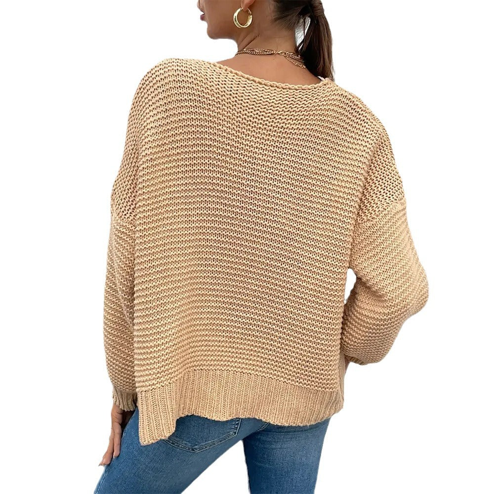Damen Strickjacke mit voluminösen Ärmel und stylischem Rippenmuster EB