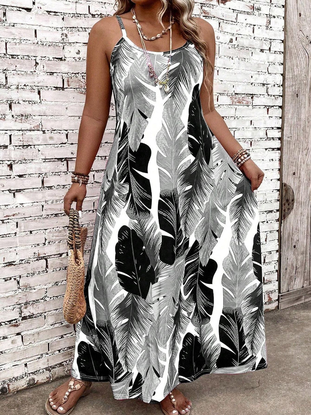Damen Maxikleid mit aufregendem Blattmuster und schmalen Trägern EB