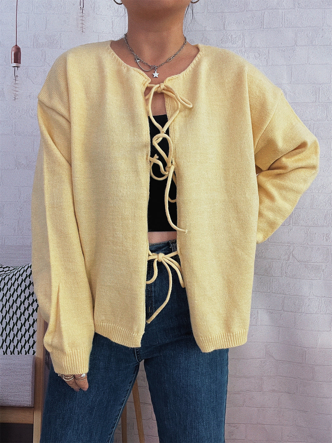 Damen Strickjacke mit dekorativem Schnürdesign und weitem Schnitt EB