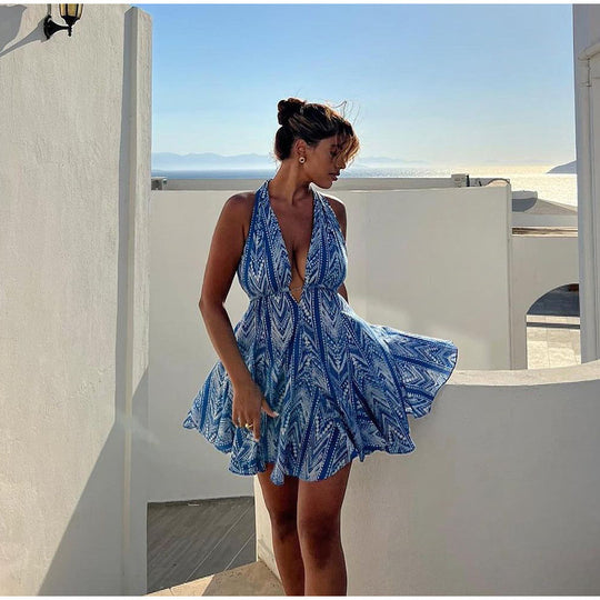 Damen Sommerliches Kleid mit tiefem V-Ausschnitt und schwingendem Rock EB