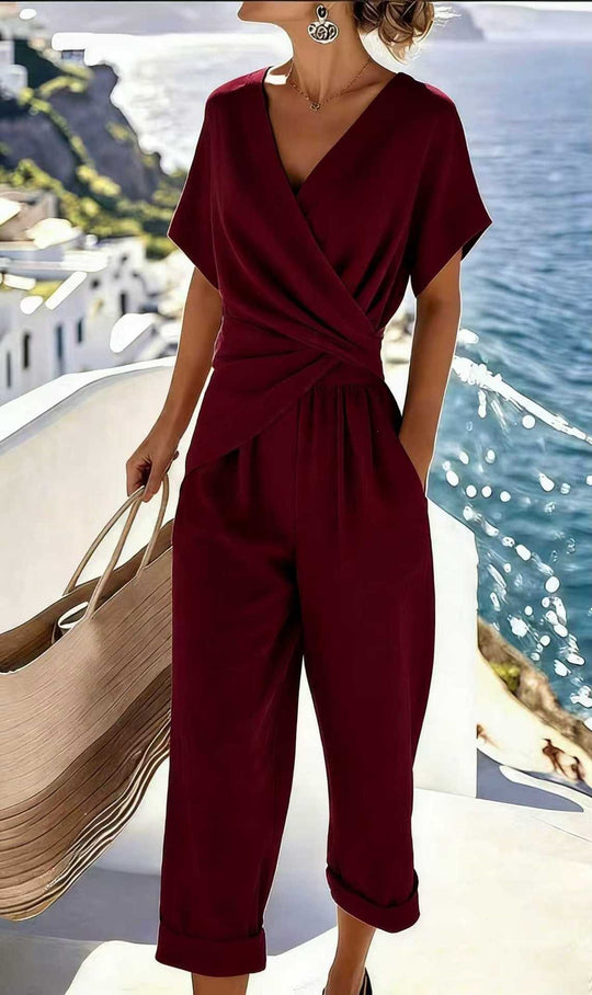 Damen Eleganter Jumpsuit mit Wickeloptik und breiten Beinen EB