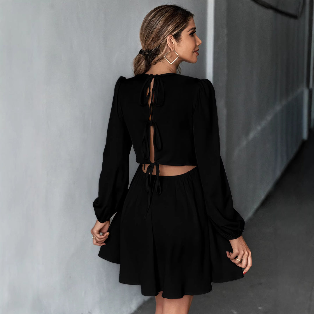 Damen schickes Cocktailkleid mit geraffter Taille, langen Ballonärmeln und rundem Ausschnitt Eichborn Berlin