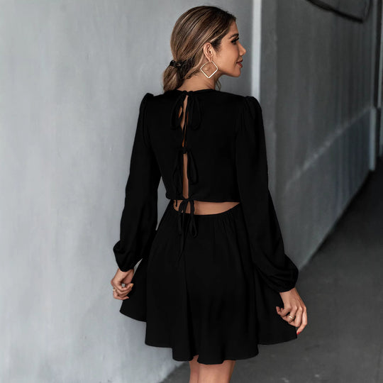 Damen schickes Cocktailkleid mit geraffter Taille, langen Ballonärmeln und rundem Ausschnitt Eichborn Berlin