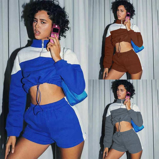 Damen modernes Sportoberteil mit kurzem Schnitt und dazu passender Shorts EB