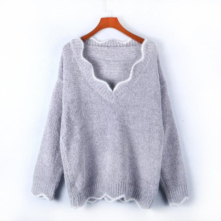 Damen kuscheliger Strickpullover mit tiefem V-Ausschnitt und gewellten Abschlüssen EB