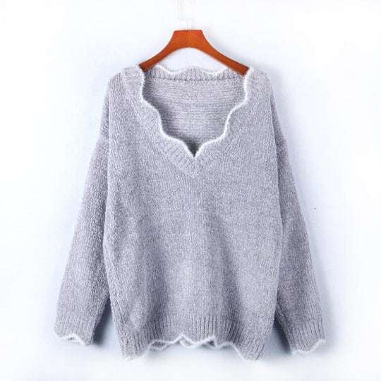 Damen kuscheliger Strickpullover mit tiefem V-Ausschnitt und gewellten Abschlüssen EB