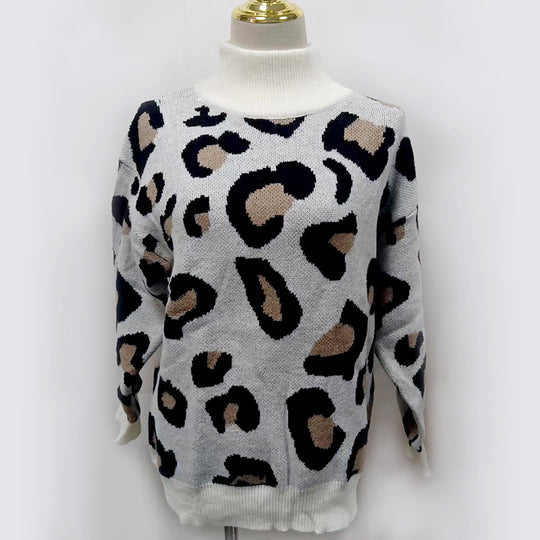 Damen Oversize Rollkragenpullover mit Leo-Jacquard und Rippbündchen EB