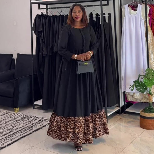 Damen Maxikleid mit schickem Rüschensaum und Knopfdetail EB