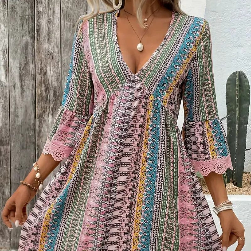 Damen Freizeitkleid mit lässigen Rüschendetails und buntem Muster EB