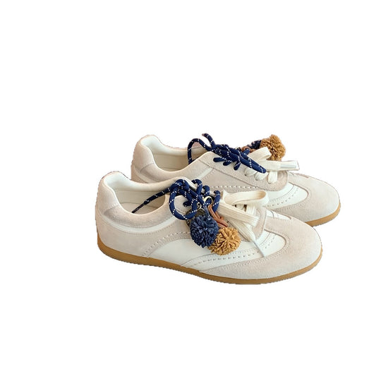 Damen bequeme Sneakers mit dekorativen Quasten und Schnürung EB
