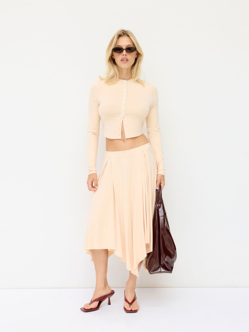 Damen Cropped-Cardigan mit Perlmuttknöpfen und asymmetrischem Zipfel-Midirock EB