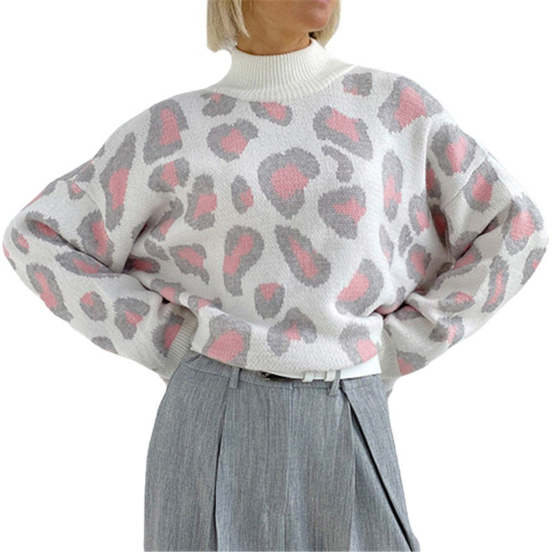 Damen Oversize Rollkragenpullover mit Leo-Jacquard und Rippbündchen EB