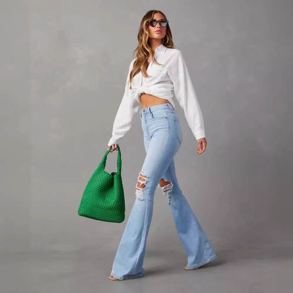 Damen Flared Jeans mit ausgefranstem Saum und verwaschenem Effekt EB