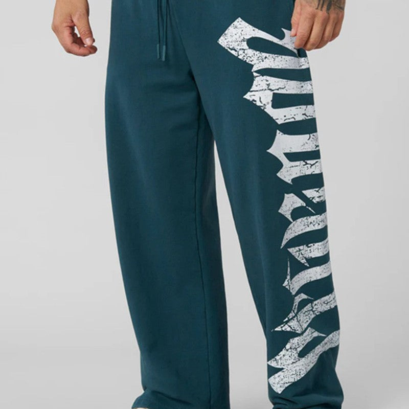 Herren nan weite Sweathose aus angerautem Fleece mit seitlichem Vintage-Print und Kordelbund EB