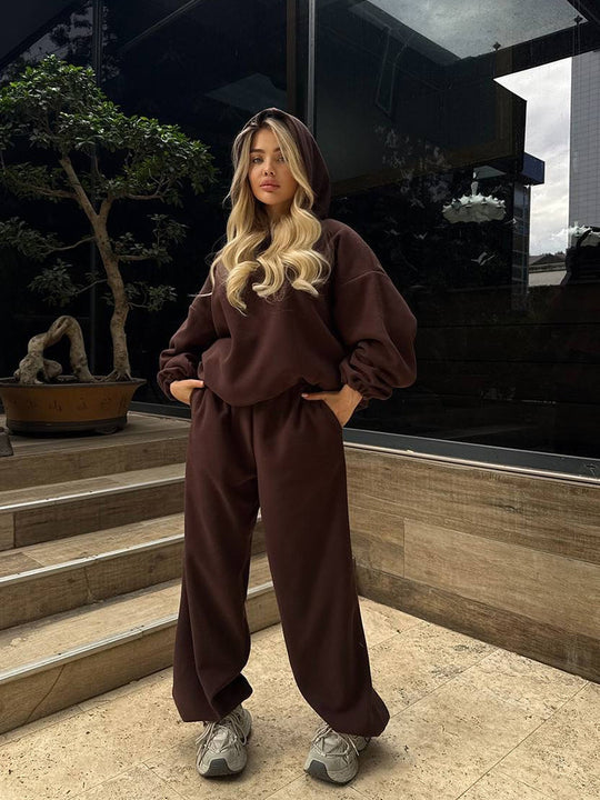 Damen oversized Kapuzen-Sweatshirt mit Ballonärmeln und weite High-Waist Jogginghose Eichborn Berlin