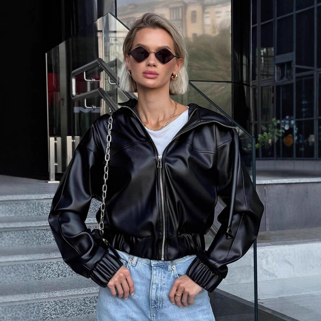 Damen cropped Kunstlederjacke mit kontrastierenden Details und elastischem Bund EB