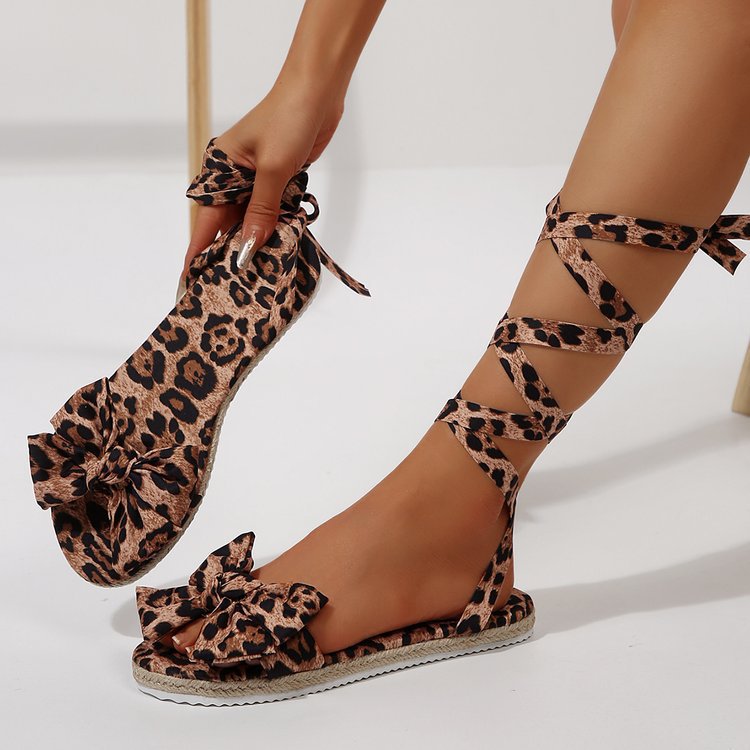 Damen Gladiator-Sandalen mit Blumendruck und Schleifenakzent EB