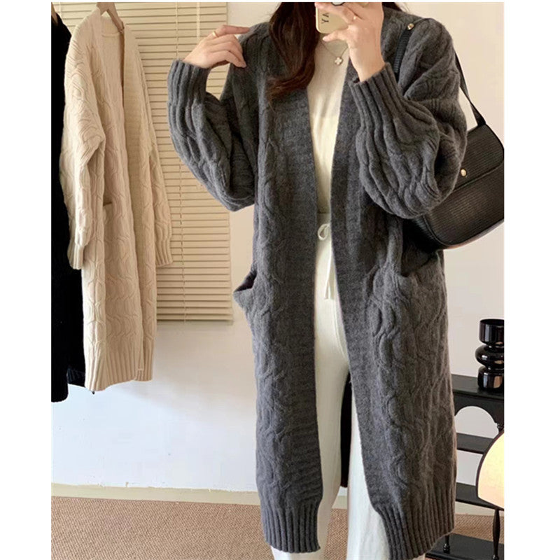 Damen Langer Strickcardigan mit voluminösen Ärmeln und praktischen Taschen EB
