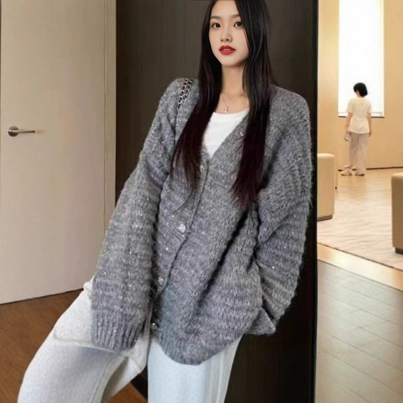 Damen Strickjacke mit voluminösen Ärmeln und einzigartiger Maschenstruktur EB