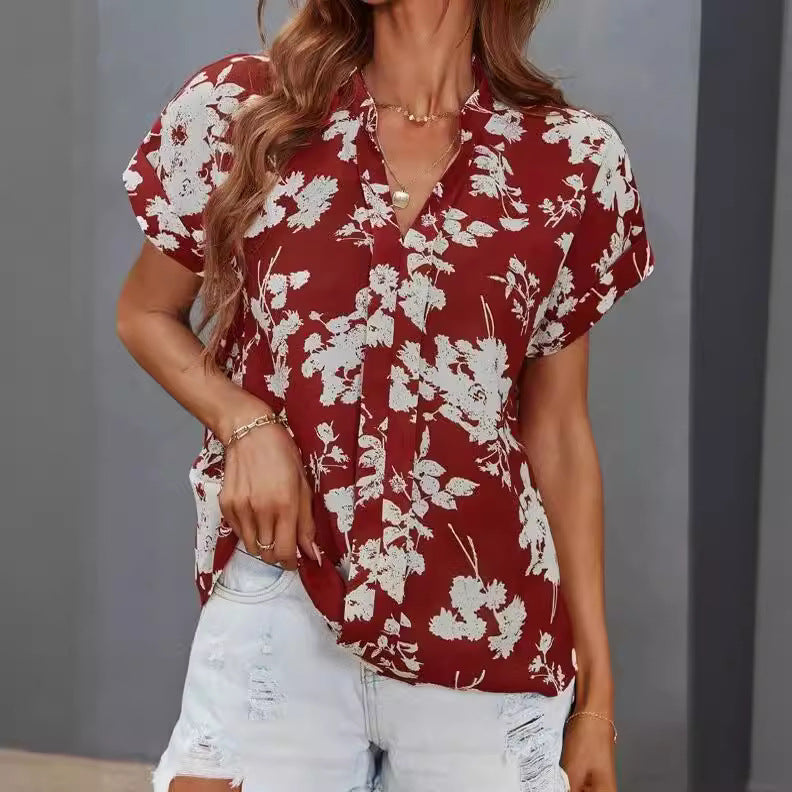 Damen lässige Bluse mit floralem Muster und kurzer Knopfleiste EB