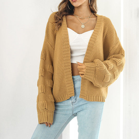 Damen Grobstrickjacke mit voluminösen Ärmeln und modernem Design EB