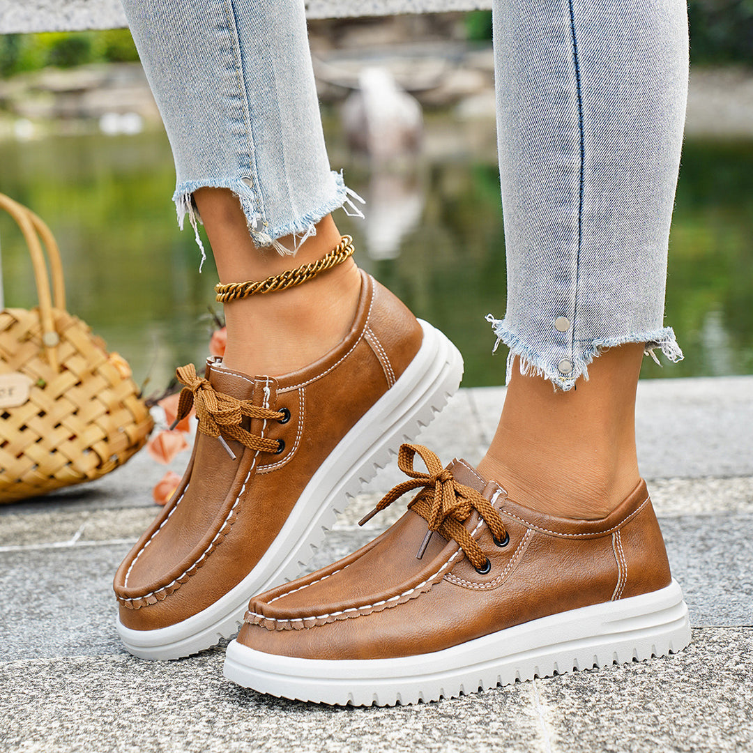 Damen Freizeit-Sneaker mit kunstlederner Optik und rutschfester Sohle EB