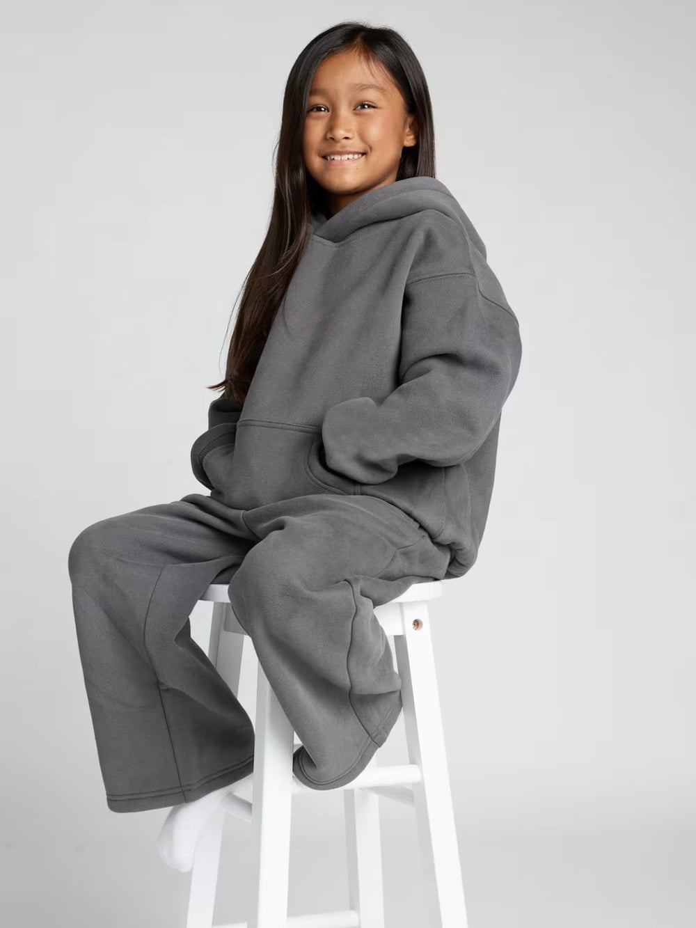 Damen lässiger Fleece-Jumpsuit mit geräumiger Kapuze und praktischen Taschen EB