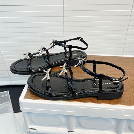 Damen Elegante Sandalen mit glitzernden Schleifen und verstellbarem Riemendesign EB
