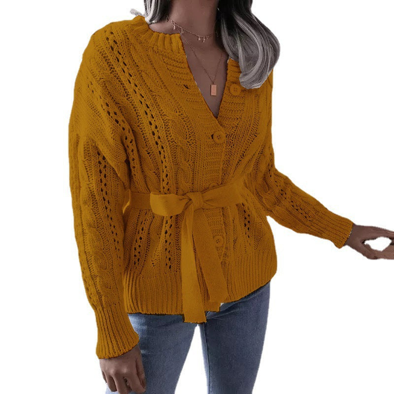 Damen Strickjacke mit Taillengürtel und auffälligem Muster EB