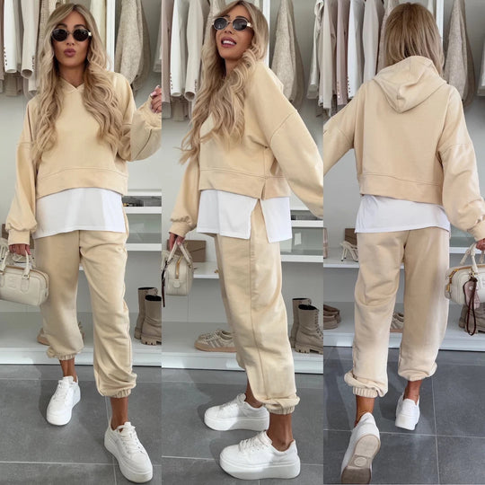 Damen Cropped-Hoodie-Lounge-Set mit asymmetrischem Saum, voluminösen Raglanärmeln und gekrempelter Jogginghose Eichborn Berlin