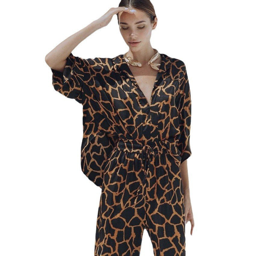 Damen Jumpsuit mit weit geschnittenen Beinen und elegantem Giraffenmuster EB
