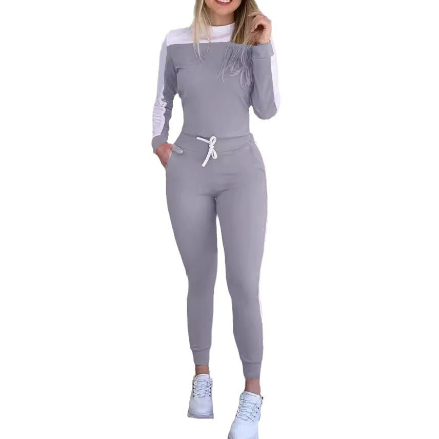 Damen Sportlicher Jumpsuit mit abnehmbaren Trägern und seitlichen Kontraststreifen EB
