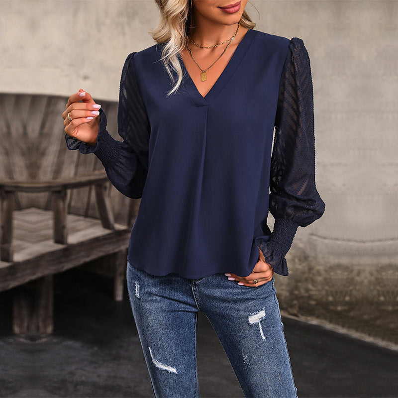 Damen Bluse mit transparenten Puffärmeln und V-Ausschnitt EB