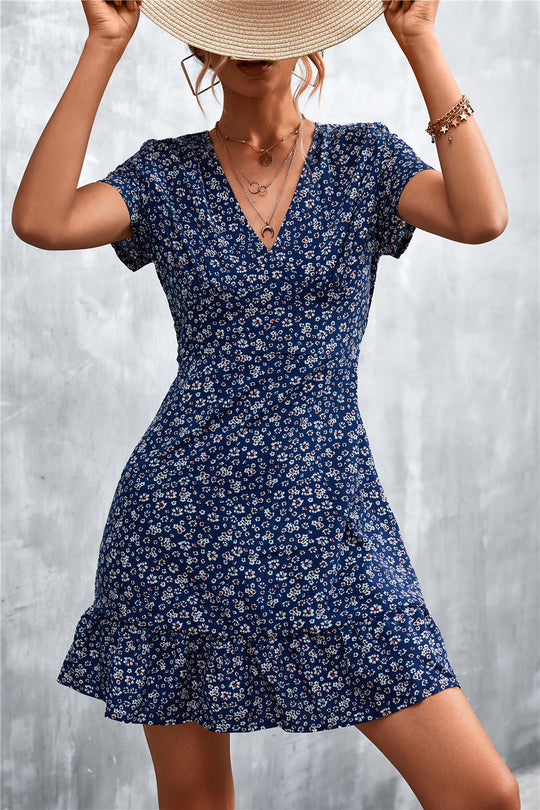 Damen Sommerliches Minikleid mit floralem Design und verspieltem Saum EB