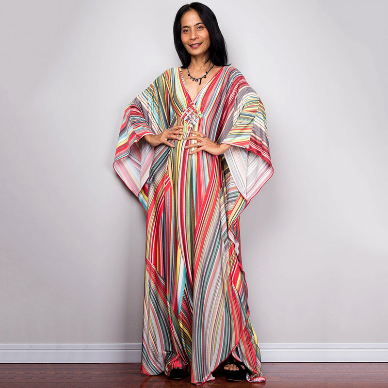 Damen Maxikleid mit kunstvollem Pfauenmuster und seitlichen Schlitzen Heidi Mode