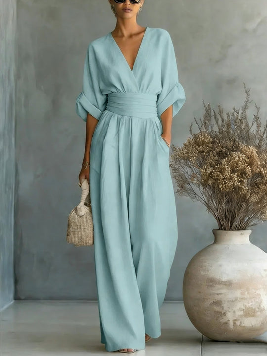 EB | Eleganter Ärmelloser Jumpsuit mit Tiefem V-Ausschnitt, Taillenbund und Weitem Bein