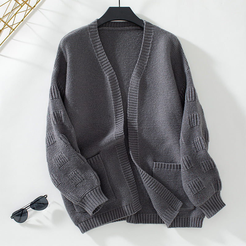 Damen weit geschnittene Strickjacke mit Taschen und strukturiertem Ärmel EB