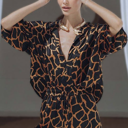 Damen Jumpsuit mit weit geschnittenen Beinen und elegantem Giraffenmuster EB