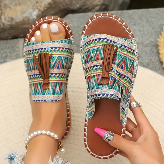 Damen Ethno-Slipper-Sandalen mit Quaste und handgenähter Ziernaht EB