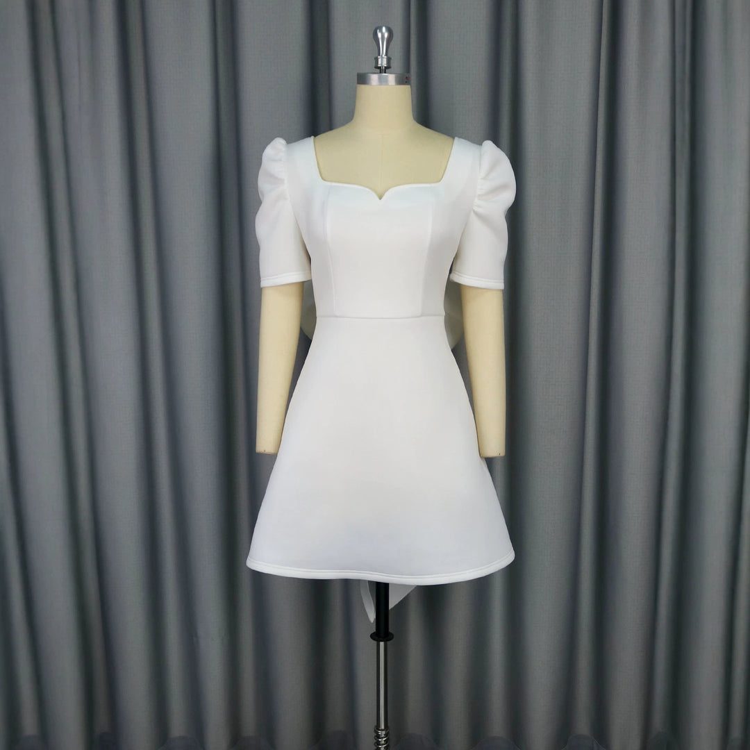 Damen Kleid mit voluminösen Puffärmeln und dekorativem Schleifendesign EB