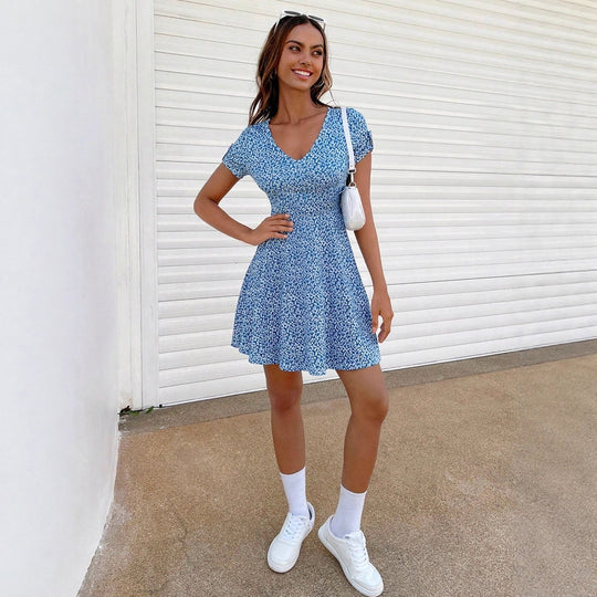 Damen Sommerliches Freizeitkleid mit floralen Mustern und schwingendem Rock EB