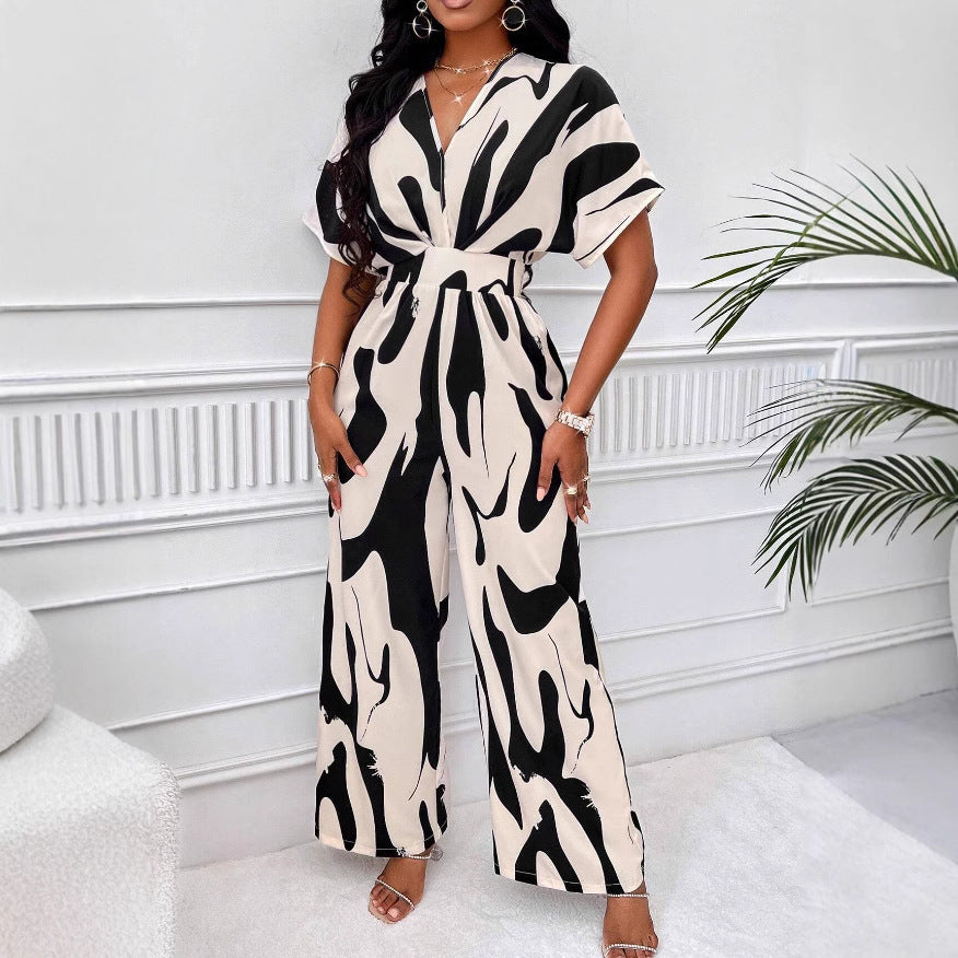Damen Jumpsuit mit weiten Ärmeln und elegantem Gürtel EB