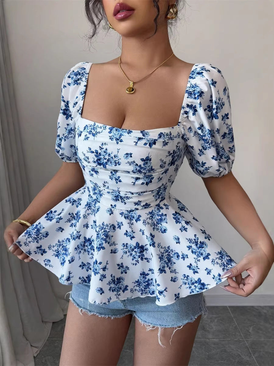 Damen Peplum-Bluse mit Puffärmeln und floralem Design EB