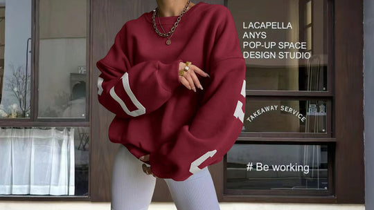 Damen Oversized Sweatshirt mit grafischen Akzenten EB