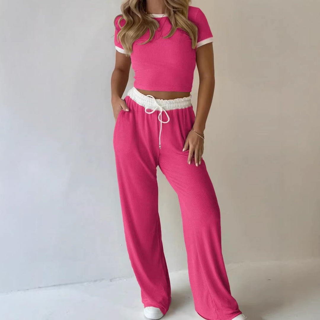 Damen lässiges zwei-teiliges Freizeit-Set mit cropped T-Shirt und weiten Hose EB